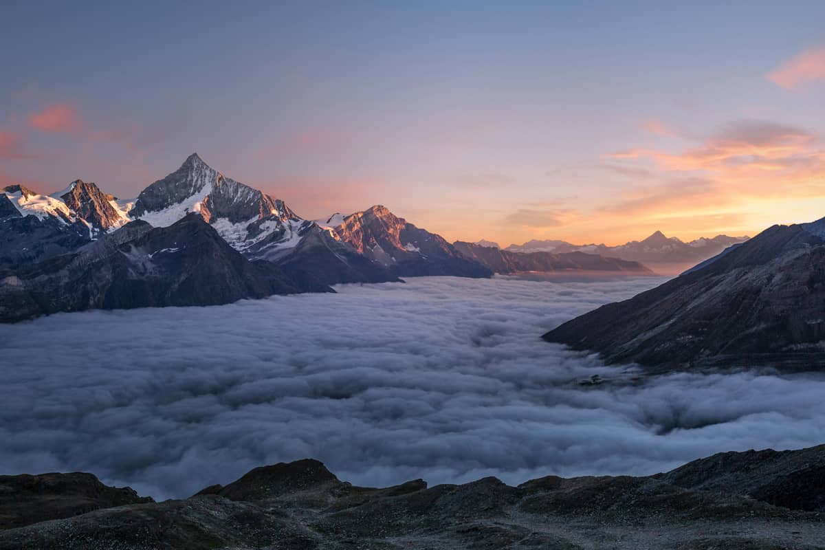 A mountain valley at golden hour, the kind of place a group plans a year for